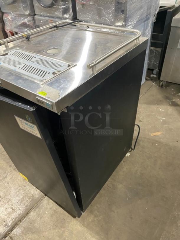 Asber ADDC23HC black single door beer cooler with stainless steel worktop, drip tray, and tower tap. On casters.
