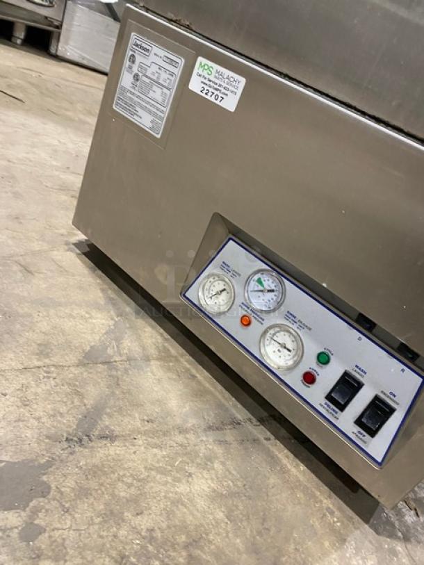 Jackson DishStarHT stainless steel undercounter dishwashing machine, electric powered, high-temperature, gauges visible, 208/230V, 1 phase, on legs. Model SN: 17F336218.