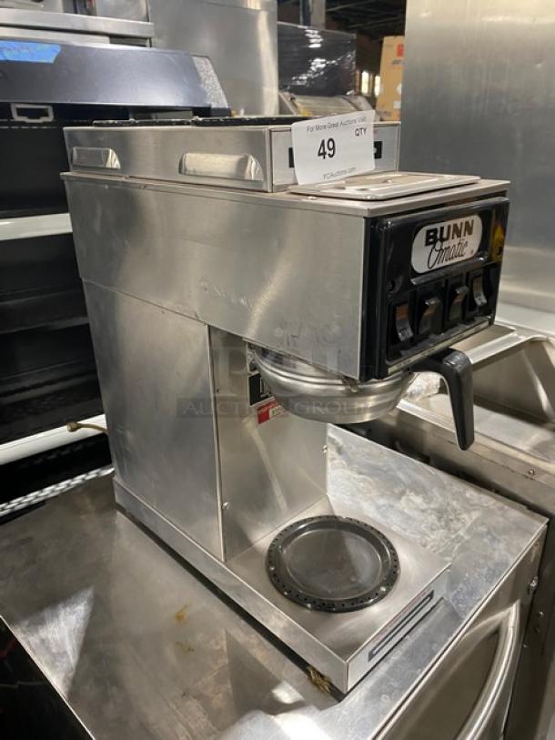 Bunn O-Matic ST-15 commercial stainless steel coffee brewer with two upper warmers, good condition, model SN 13200.