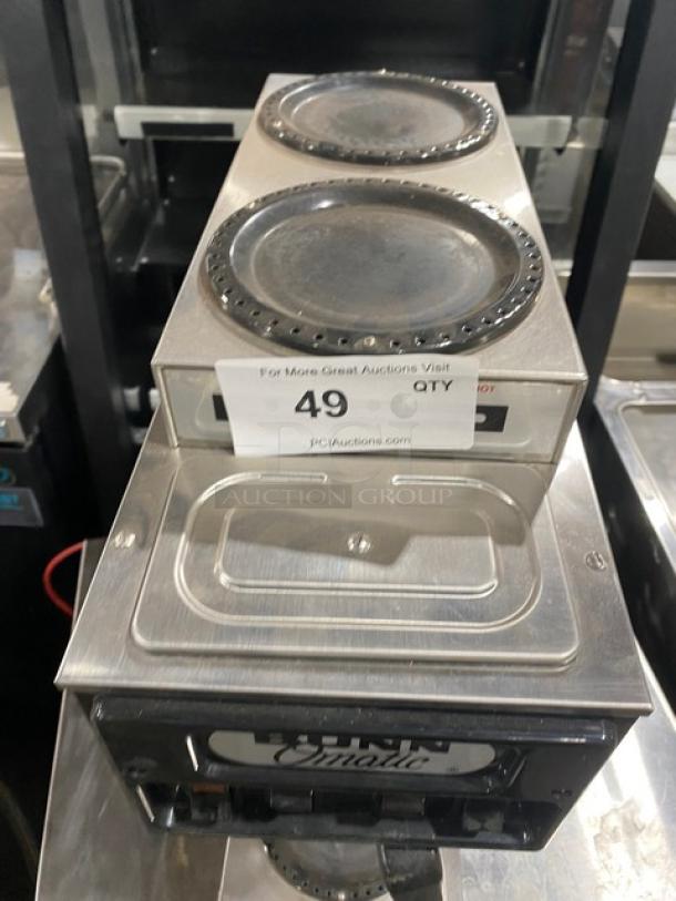 Bunn O-Matic ST-15 stainless steel coffee brewer with 2 upper warmers. Good condition, includes model and serial number tags.