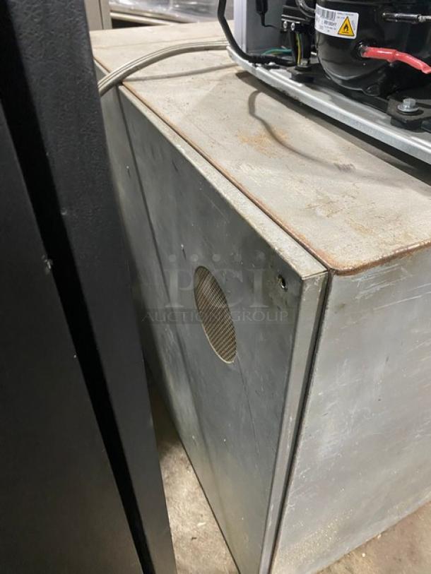 Commercial stainless steel electric countertop pizza deck oven, thermostatic controls visible, some surface wear.
