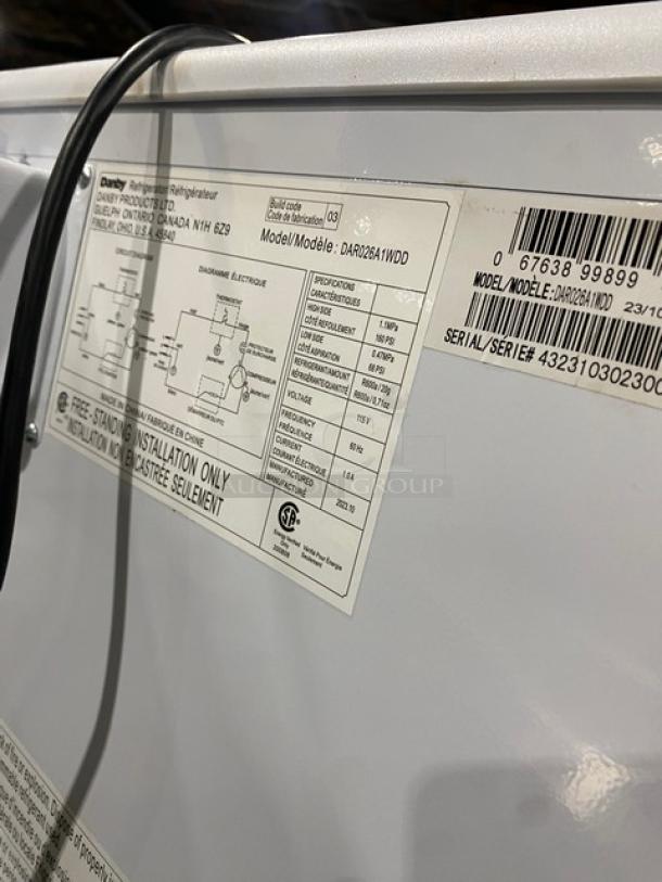 Danby Commercial refrigerator, model DAR026A1WDD, Energy Star, poly-coated wire racks, serial 432310302300, 115V, on legs.