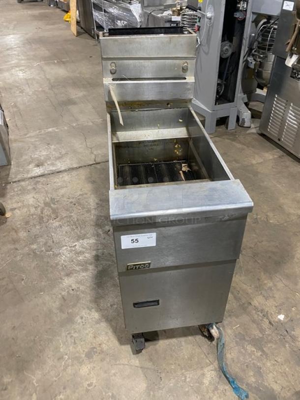 Pitco commercial stainless steel natural gas deep fat fryer with back splash, basket hanger, on casters. Model details visible.