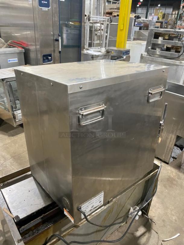 Wittco 1220-3 stainless steel heated holding system, electric, 120V, 1 phase, with side handles, in used condition.