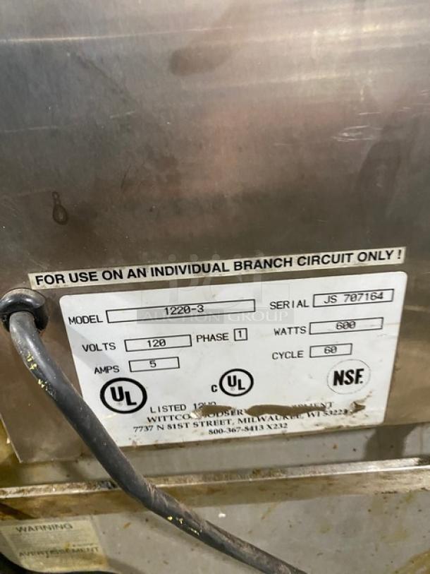 Wittco 12203 stainless steel electric heated holding system with model label showing 120V, 1 Phase, 600W, serial JS707164.