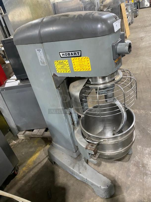 Hobart Legacy Series HL662 60 Qt. Planetary Mixer with stainless steel bowl, guard, and spiral dough hook. 200-240V.