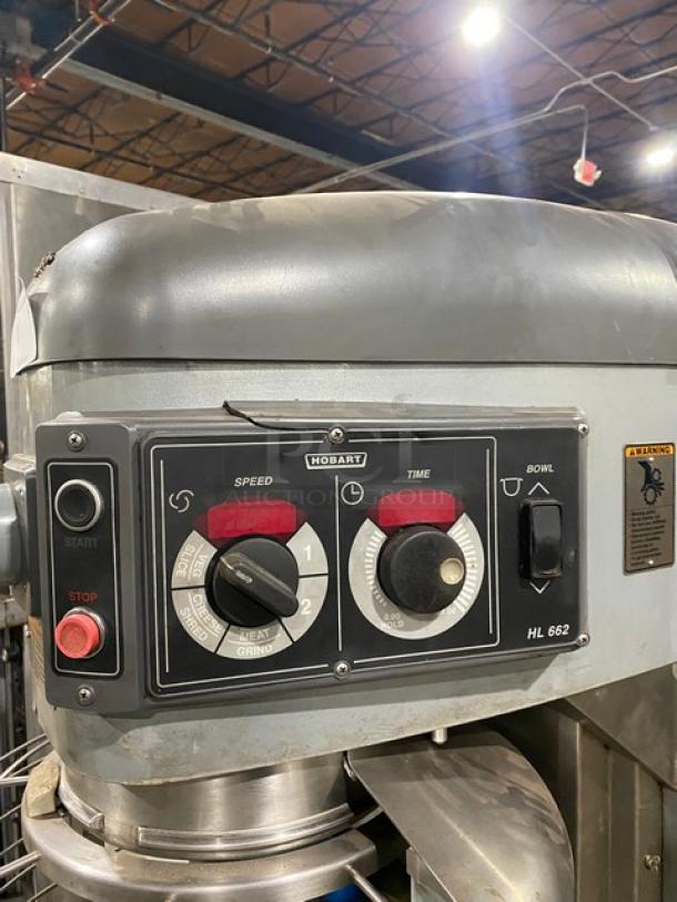 Hobart Legacy HL662 commercial 60 qt. mixer with stainless bowl guard, mixing bowl, and spiral dough hook. Model HL662, electric, 200-240V.