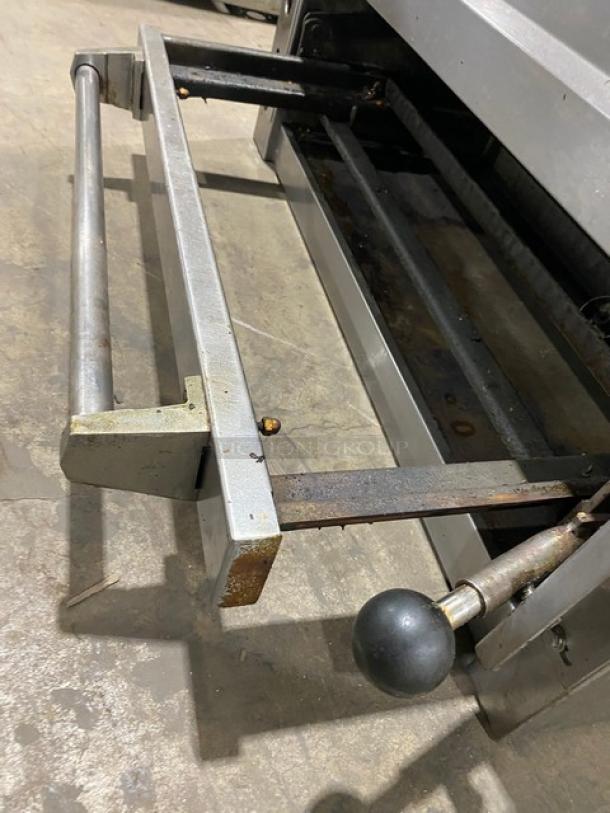 Jade Range stainless steel natural gas salamander broiler/cheese melter, commercial use, visible wear, sturdy construction.