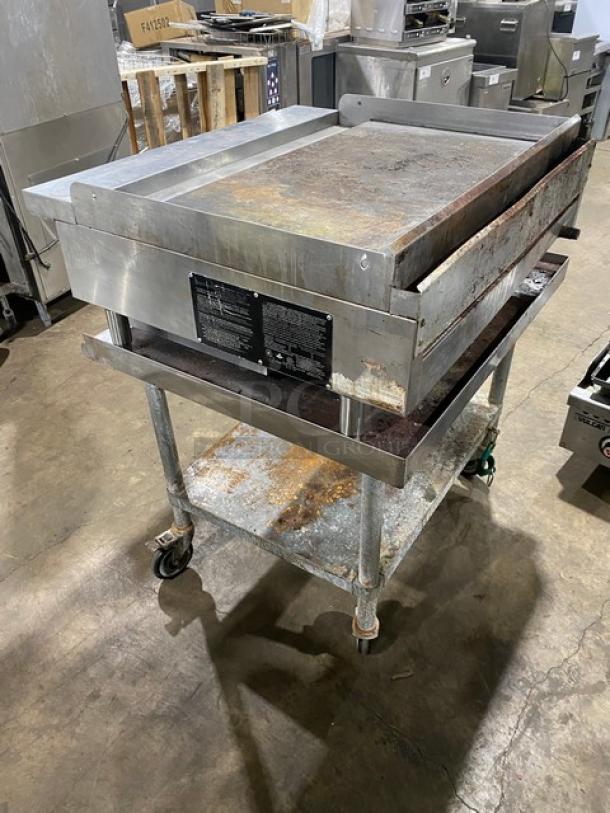 Sierra 2017 stainless steel natural gas flat griddle on undershelf cart, thermostatic controls, on casters, used condition.