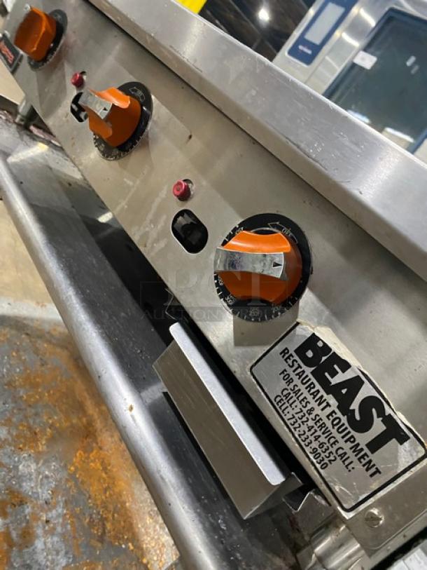 Sierra 2017 commercial stainless steel natural gas griddle with thermostatic controls, undershelf stand, on casters.