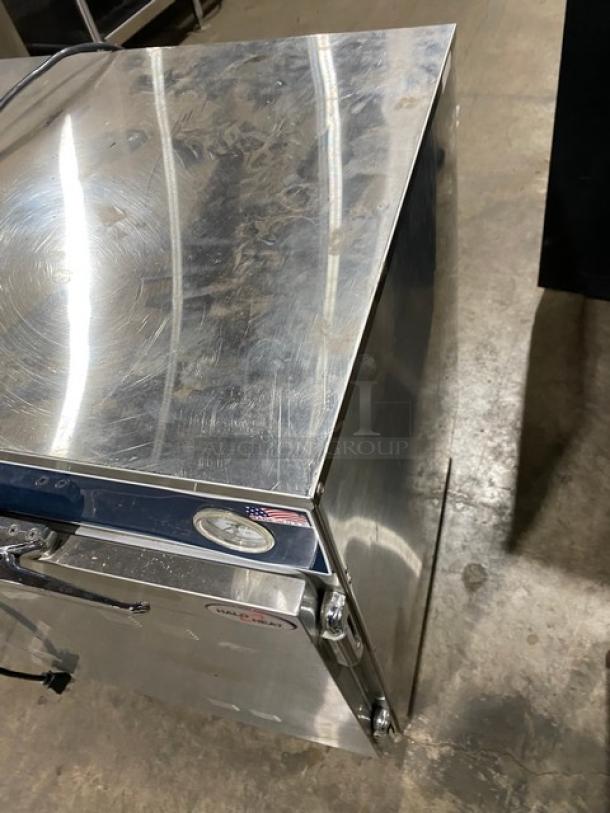 Alto-Shaam Halo Heat 750-CTUS, two-door stainless steel hot food holding cabinet, on casters, electric, model 750CTUS.