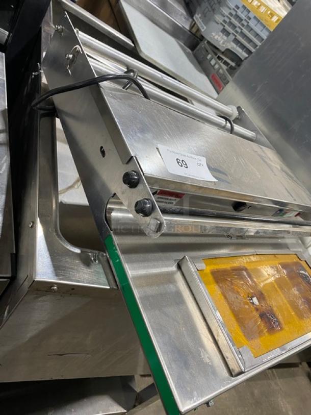 Heat Seal 700ESD stainless steel wrapper machine, tabletop model, electric powered, energy-efficient, in used condition, 120V.
