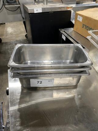 Commercial stainless steel hotel/steamtable pan with durable construction. Stackable design. Item tag indicating auction lot 72.