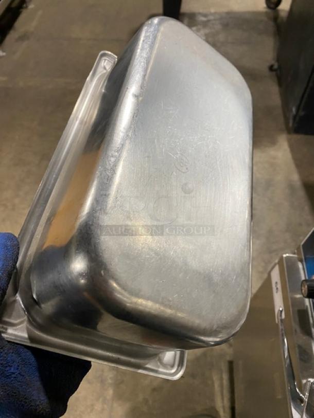 Commercial stainless steel steamtable pan in used condition, rectangular shape, durable, suitable for hotel kitchens.