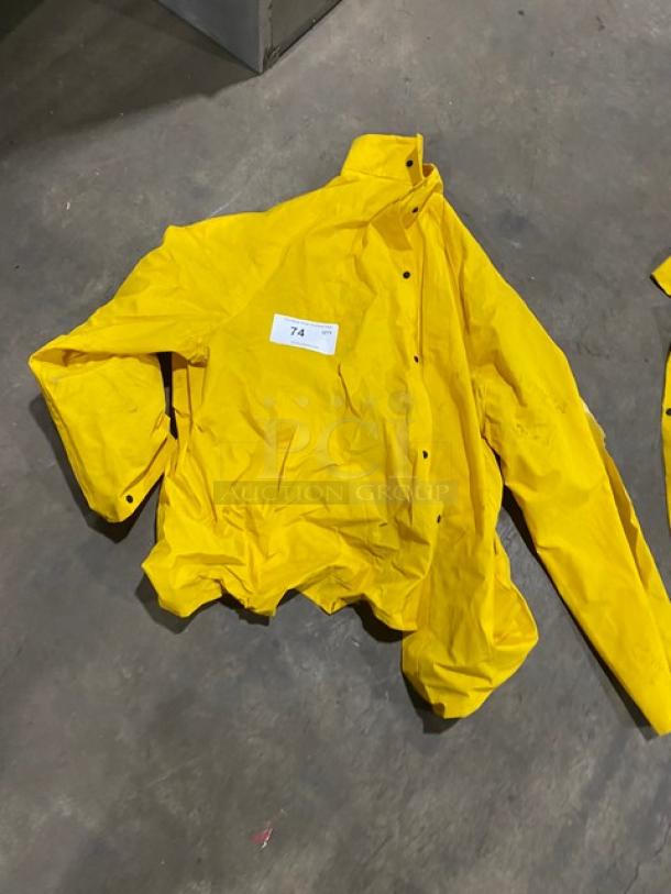 Palmer Safety RS160 yellow PVC raincoat, 2X size, commercial-grade, in fair condition. Label reads "74".