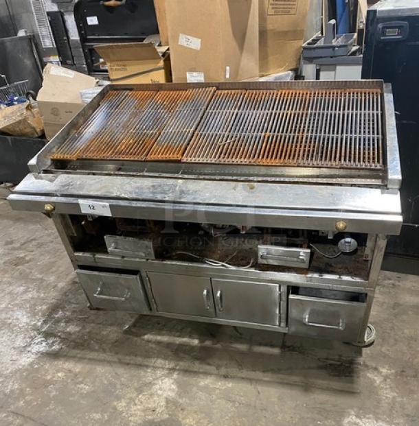 Jade Range commercial stainless steel gas/charcoal smoker grill, features pan slide, enclosed storage, casters; worn grates.