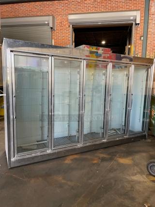 Marc Refrigeration stainless steel merchandiser freezer, model GDL-5, with 5 glass swing doors and poly-coated wire racks.