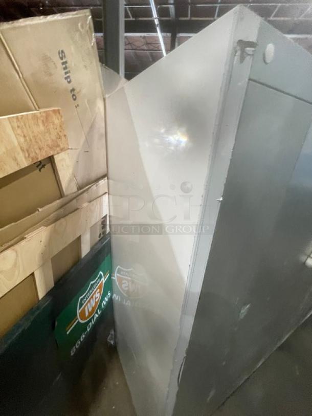 Marc Refrigeration stainless steel merchandiser freezer, model GDL-5, with 5 glass swing doors, poly-coated wire racks.