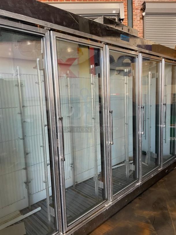Marc Refrigeration stainless steel freezer, model GDL-5, with 5 glass swing doors and poly-coated wire racks.