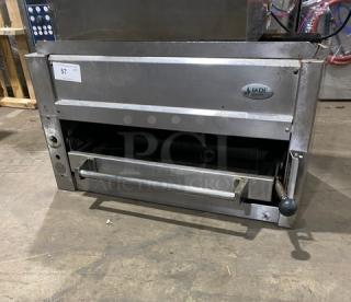 Jade Range commercial stainless steel natural gas-powered overhead salamander broiler/cheese melter, slight surface wear.