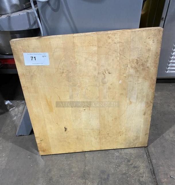Commercial wooden chopping block style square tabletop, used condition, light wood grain, visible wear marks, ID tag 71.