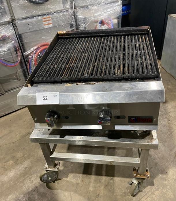 Ikon stainless steel natural gas char broiler with open base equipment stand on casters. Features dual knobs and grilling surface.