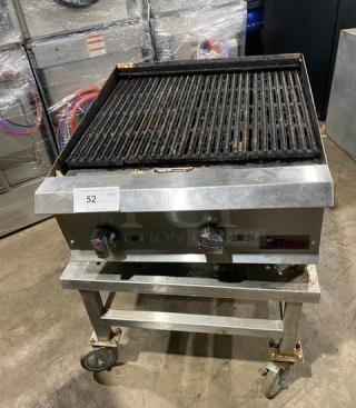 Ikon stainless steel natural gas char broiler with open base equipment stand on casters. Features dual knobs and grilling surface.