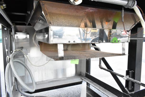 Stainless steel Wood Stone WS-MS-6-RFG-IR-W-NG commercial floor-style natural gas pizza oven, robust condition.