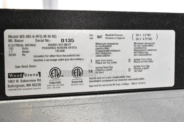 Wood Stone WS-MS-6-RFG-IR-W-NG stainless steel commercial gas pizza oven label showing model details and usage specifications.