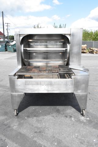 Wood Stone WS-SFR-6-SB stainless steel commercial rotisserie with charbroiler, six spits, on commercial casters.