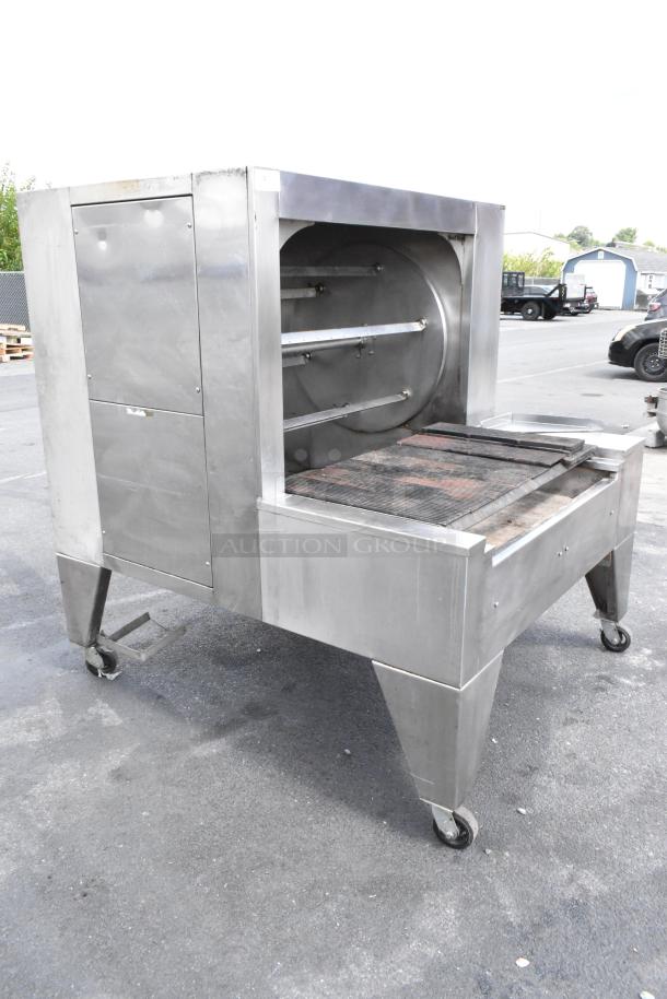 Wood Stone WS-SFR-6-SB stainless steel commercial 6 spit rotisserie with charbroiler grill, in used condition, on casters.