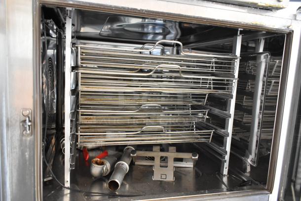 Two 2021 Rational iCombiPro convection ovens, stainless steel, 440/480V, 3-phase, with racks and accessories inside.