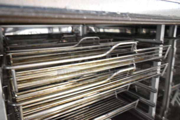 2021 Rational LM100CE.AXXXX/LM100EE.AXXXX stainless steel iCombiPro convection ovens with visible racks, 440/480V, 3 phase.