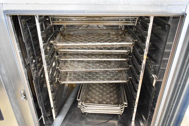 Rational iCombiPro convection oven interior with trays. Stainless steel, electric powered, 440/480V, 3 phase.