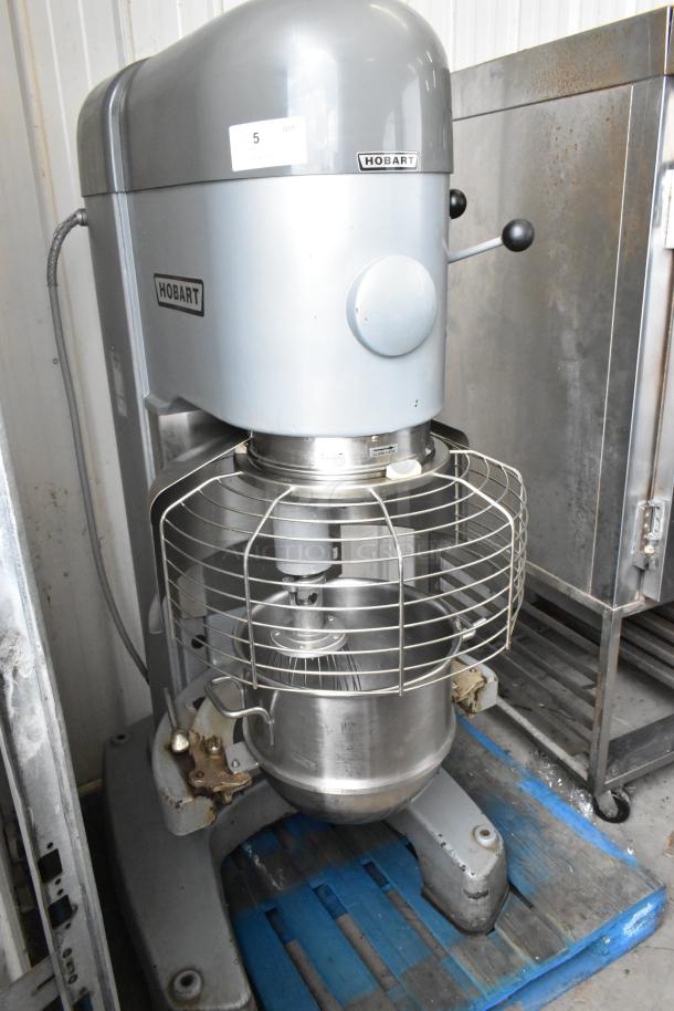 Hobart M802 80 Quart Mixer, 200V, 3 Phase, with stainless steel bowl, whisk, and bowl guard. Good condition.