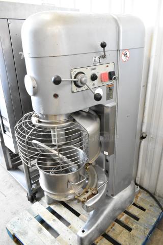Hobart M802 80-quart metal dough mixer with stainless steel bowl, bowl guard, paddle, and whisk attachments. 200V, 3 phase.