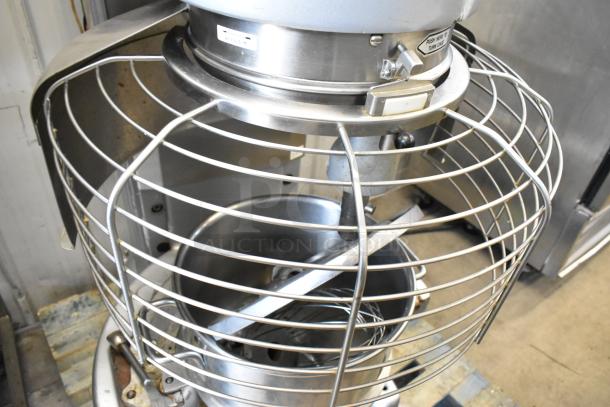 Hobart M802 commercial mixer with stainless steel bowl, bowl guard, paddle, and whisk attachment. 200V, 3 phase.