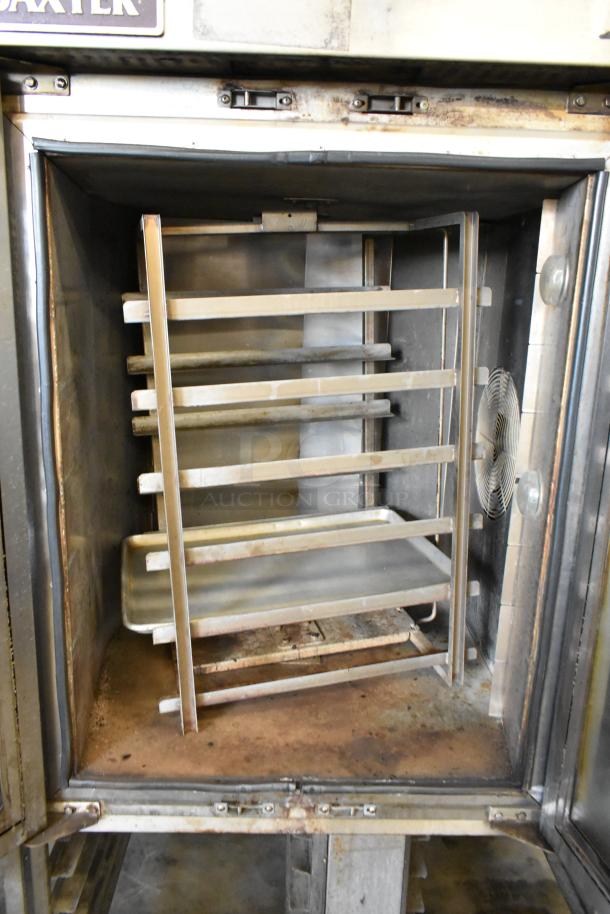 Baxter Stainless Steel Commercial Natural Gas Mini Rotating Rack Oven with dual pan rack, on casters, used condition.
