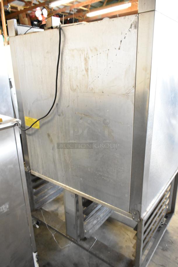 Baxter stainless steel commercial mini rotating rack oven, natural gas powered, dual pan rack, on casters, signs of use.