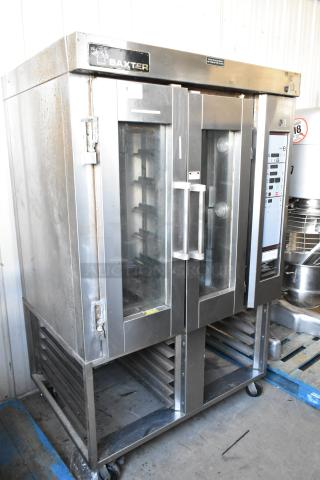 Baxter stainless steel commercial natural gas mini rotating rack oven with dual pan rack, on commercial casters. Visible control panel.