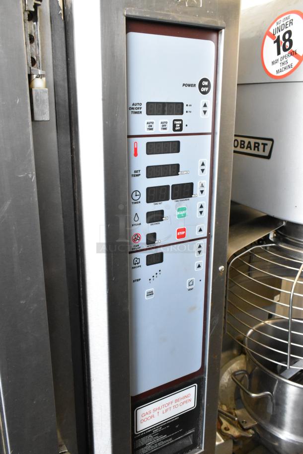Baxter stainless steel commercial gas rotating rack oven with control panel, dual pan rack, on casters.
