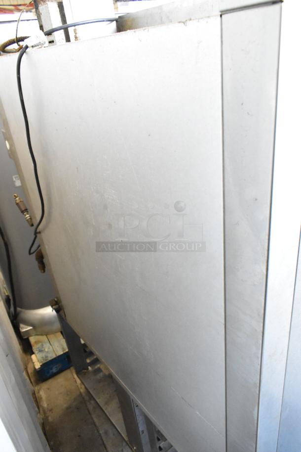 Baxter stainless steel commercial natural gas mini rotating rack oven, dual pan rack, commercial casters, good condition.