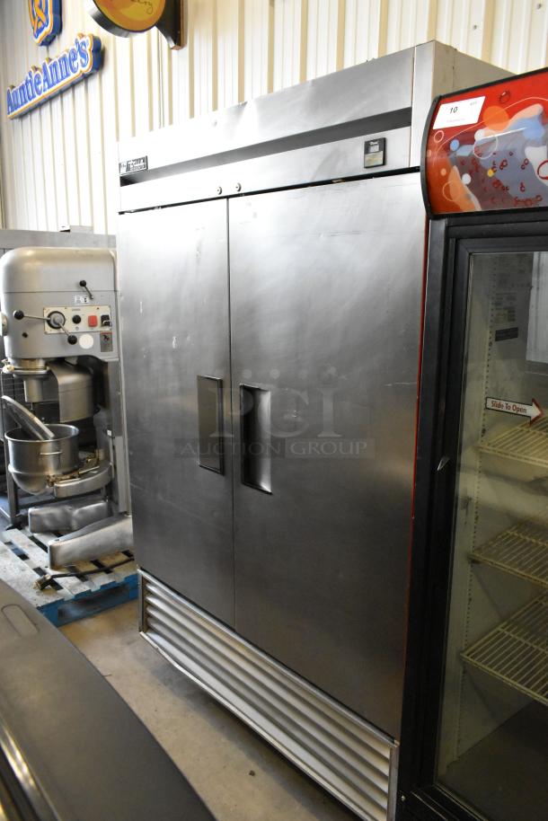 True TS-49 stainless steel 2-door commercial cooler, poly coated racks, on casters, 115V, 1 phase, good condition.