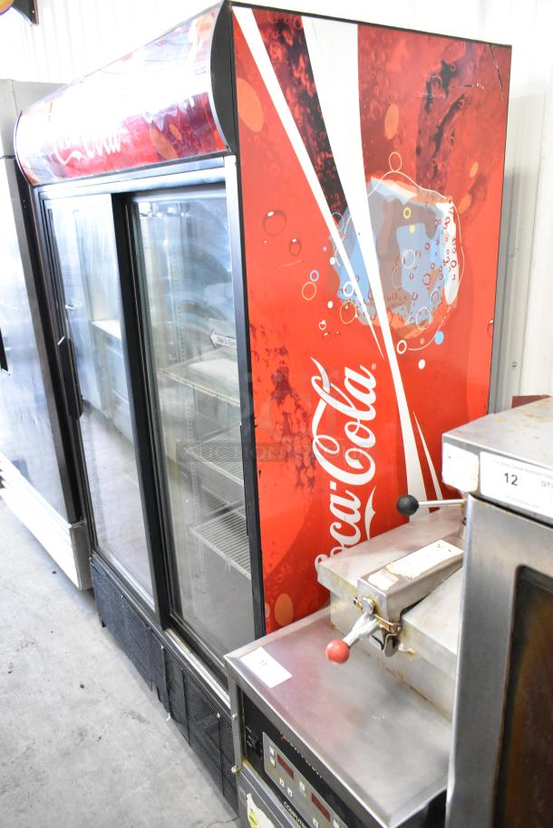 True GDM-45 metal commercial 2-door reach-in cooler with poly-coated racks, featuring Coca-Cola branding, 115 volts, 1 phase.
