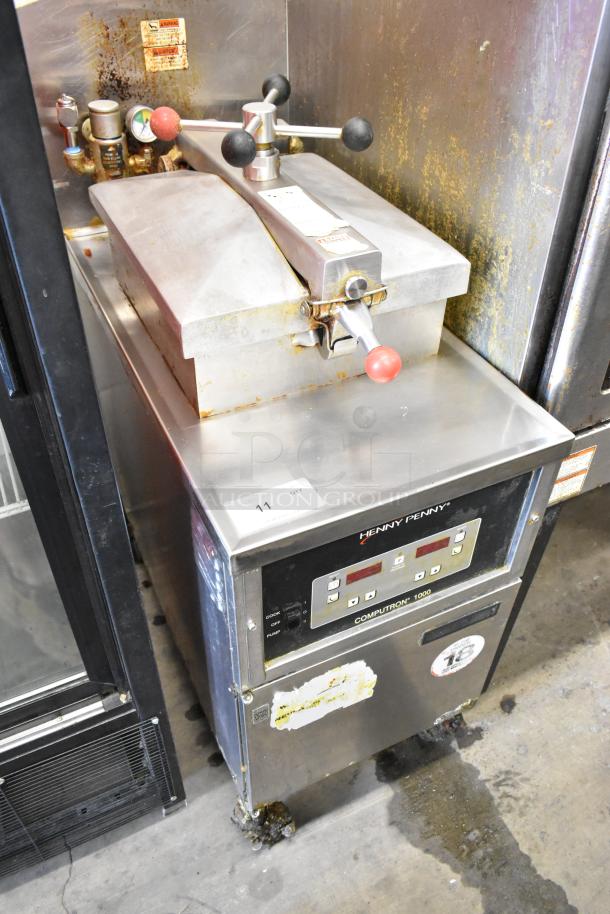Henny Penny 600 stainless steel pressure fryer, natural gas, 80,000 BTU, on casters, used condition. Control panel visible.