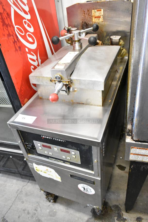 Henny Penny 600 stainless steel gas pressure fryer, floor style, 80,000 BTU, with control panel and commercial casters.