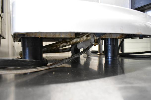 Schaerer metal commercial countertop automatic espresso machine, missing hoppers, 120-208/240V, 1 phase. Visible wiring underneath.
