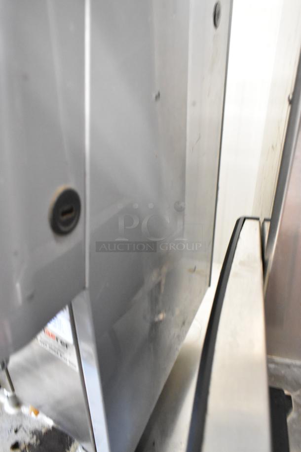 Schaerer metal commercial countertop automatic espresso machine, missing hoppers, 120-208/240V, 1 phase. Visible wear.