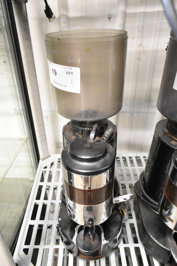 Rossi RR45 metal commercial espresso bean grinder, lacks lid, 115 volts, 1 phase, used condition, auction label attached.