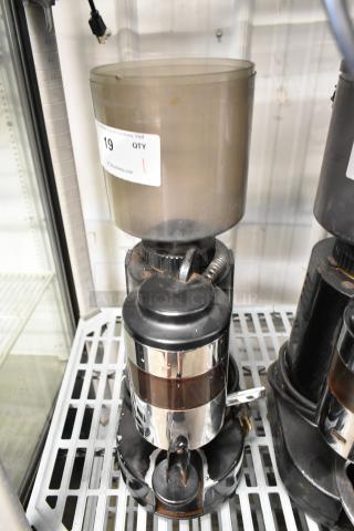 Rossi RR45 metal commercial espresso bean grinder, lacks lid, 115 volts, 1 phase, used condition, auction label attached.